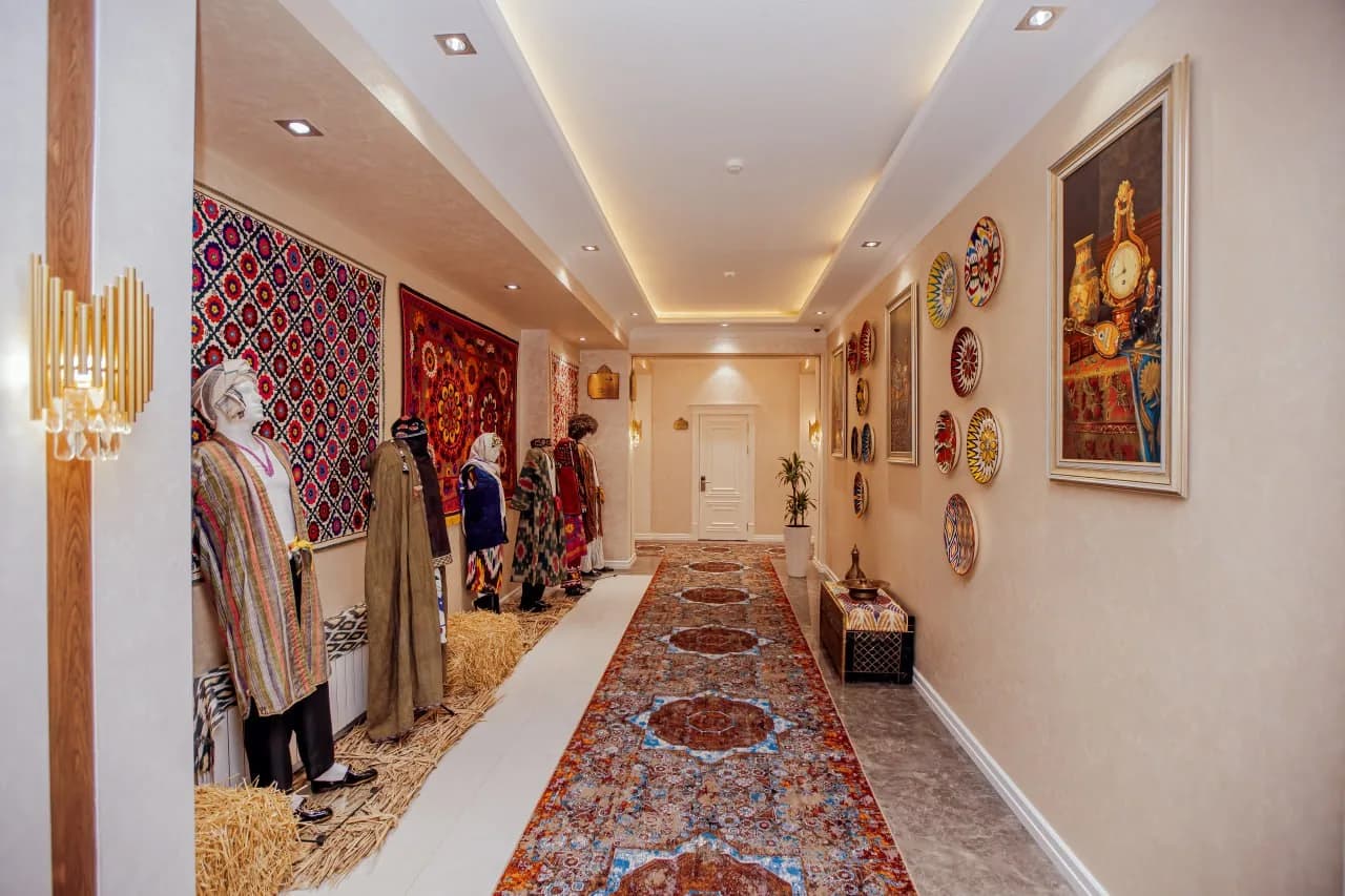 Silk Road Empire hotel corridor with national costumes